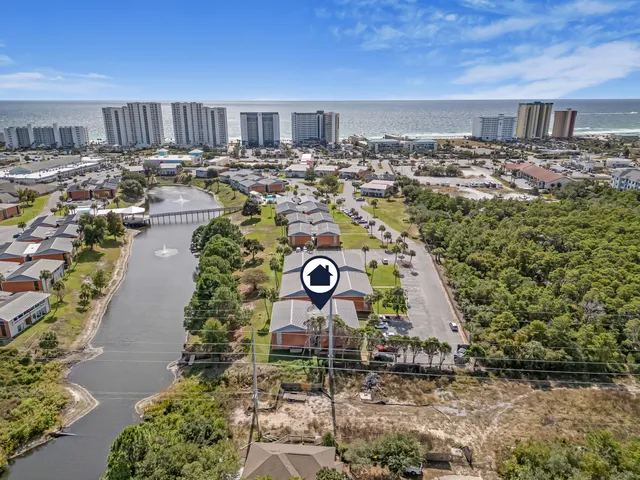 a view of a lake with a house