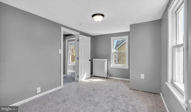 an empty room with windows