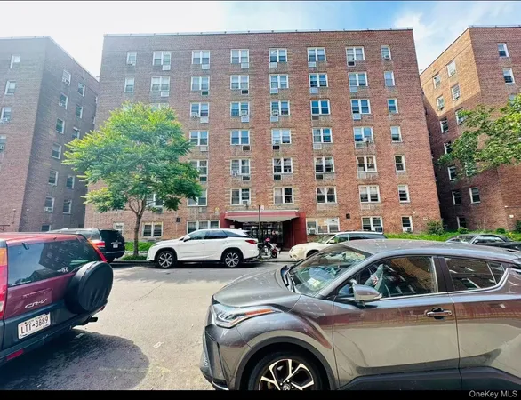a view of a cars parked in front of a building