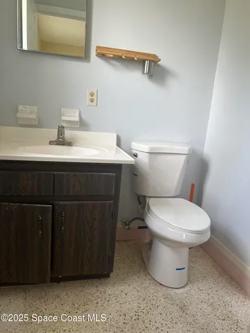 a bathroom with a sink and a toilet