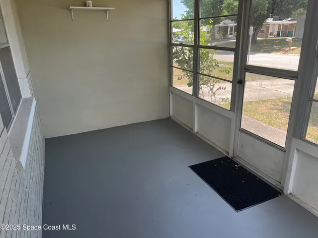 an empty room with windows