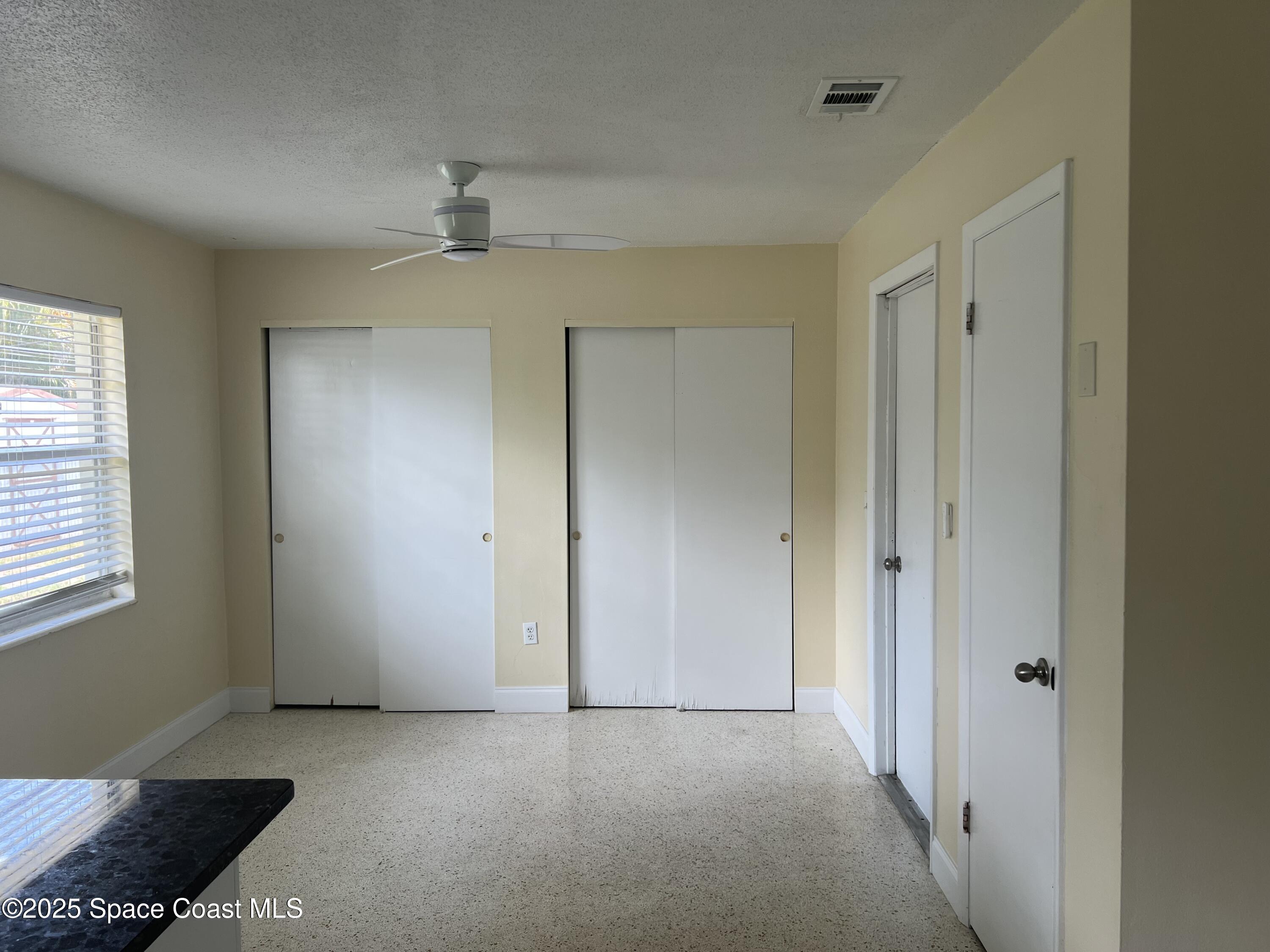 2906 Rollins Street Melbourne, FL 32901 - Photo 5 of 12 a view of an empty room with a window