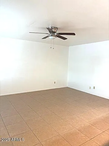 a view of a refrigerator in a room