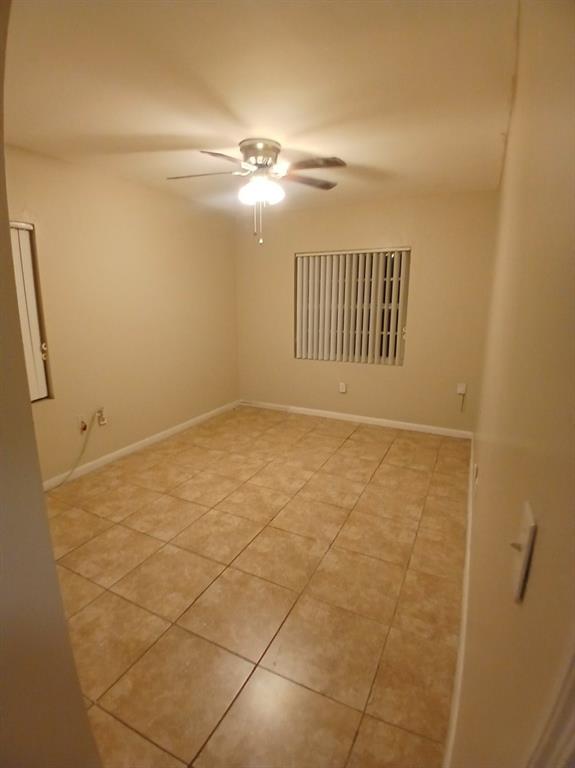 5759 Southwest 61st Street Miami, FL 33143 - Photo 8 of 9 a view of an empty room