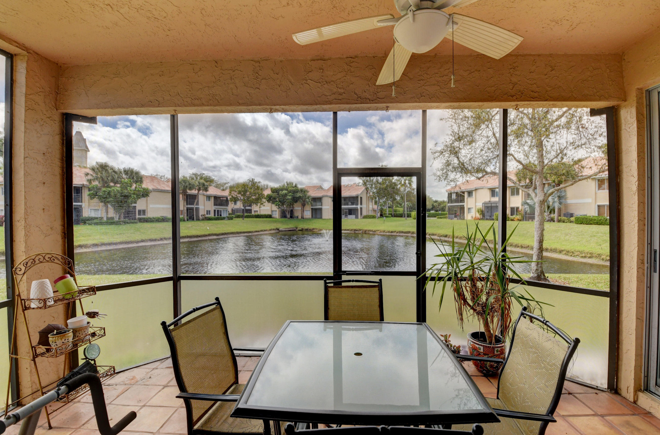 23061 Aqua View, Unit 1 Boca Raton, FL 33433 - Photo 18 of 29 a view of a dining room with furniture window and outside view