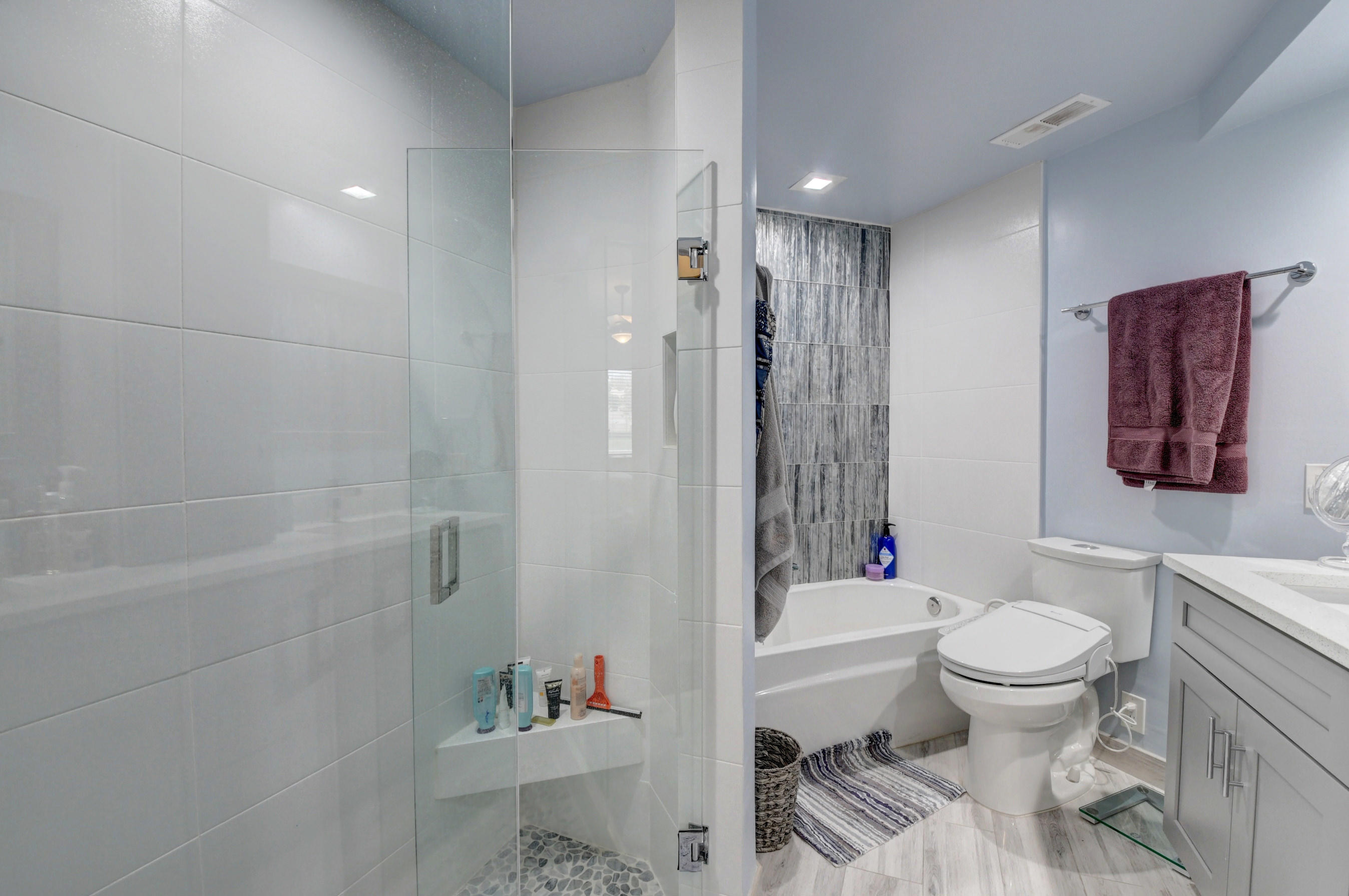 23061 Aqua View, Unit 1 Boca Raton, FL 33433 - Photo 24 of 29 a bathroom with a toilet and a shower