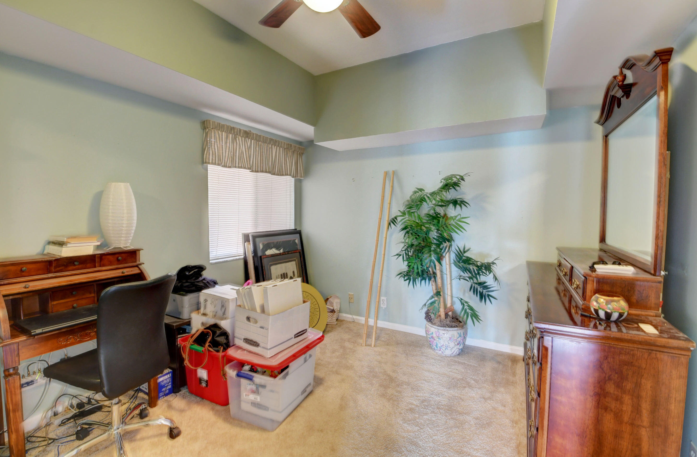23061 Aqua View, Unit 1 Boca Raton, FL 33433 - Photo 26 of 29 a living room with furniture and a potted plant