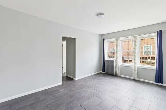 an empty room with windows