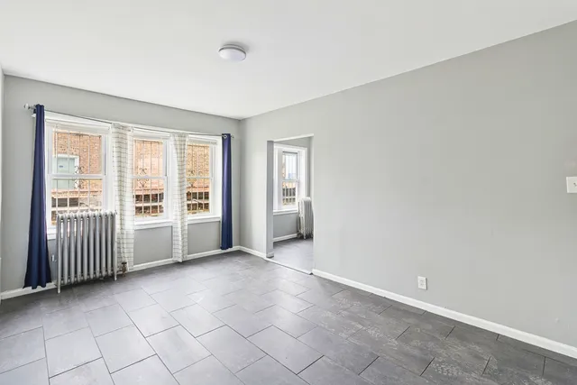 an empty room with windows