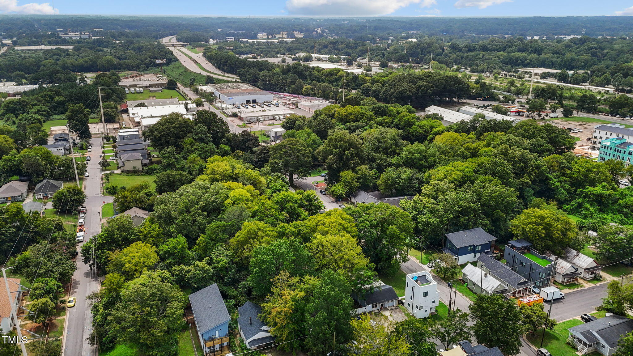 400 Bragg Street Raleigh, NC 27601 - Photo 61 of 62 an aerial view of a city with lots of residential buildings