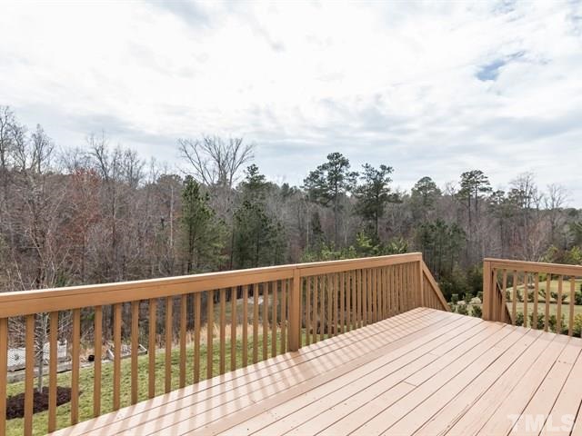 209 Amiable Loop Cary, NC 27519 - Photo 24 of 25 a view of balcony with wooden floor and fence