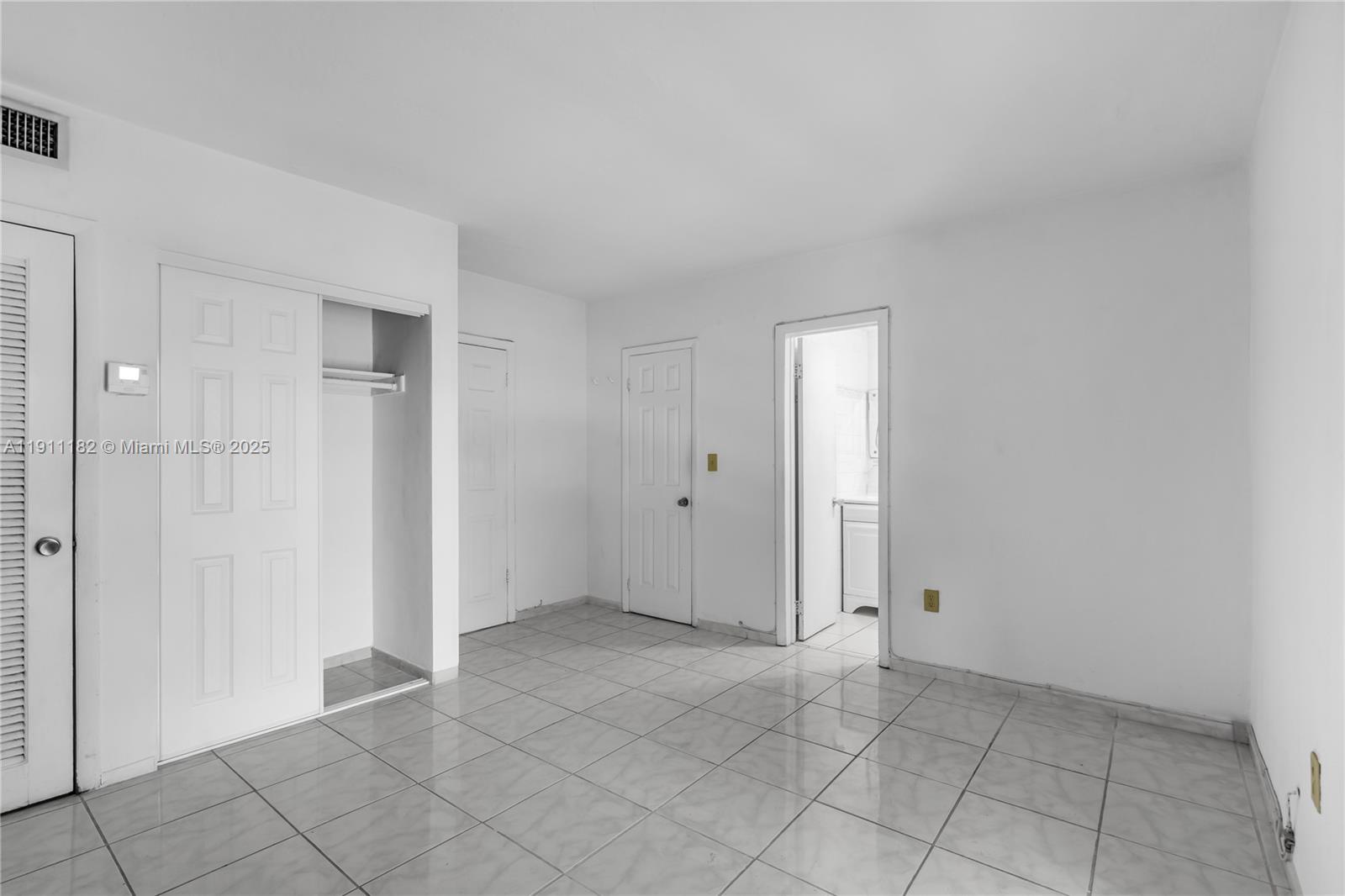 1330 West 54th Street, Unit 302C Hialeah, FL 33012 - Photo 11 of 20 a view of an empty room