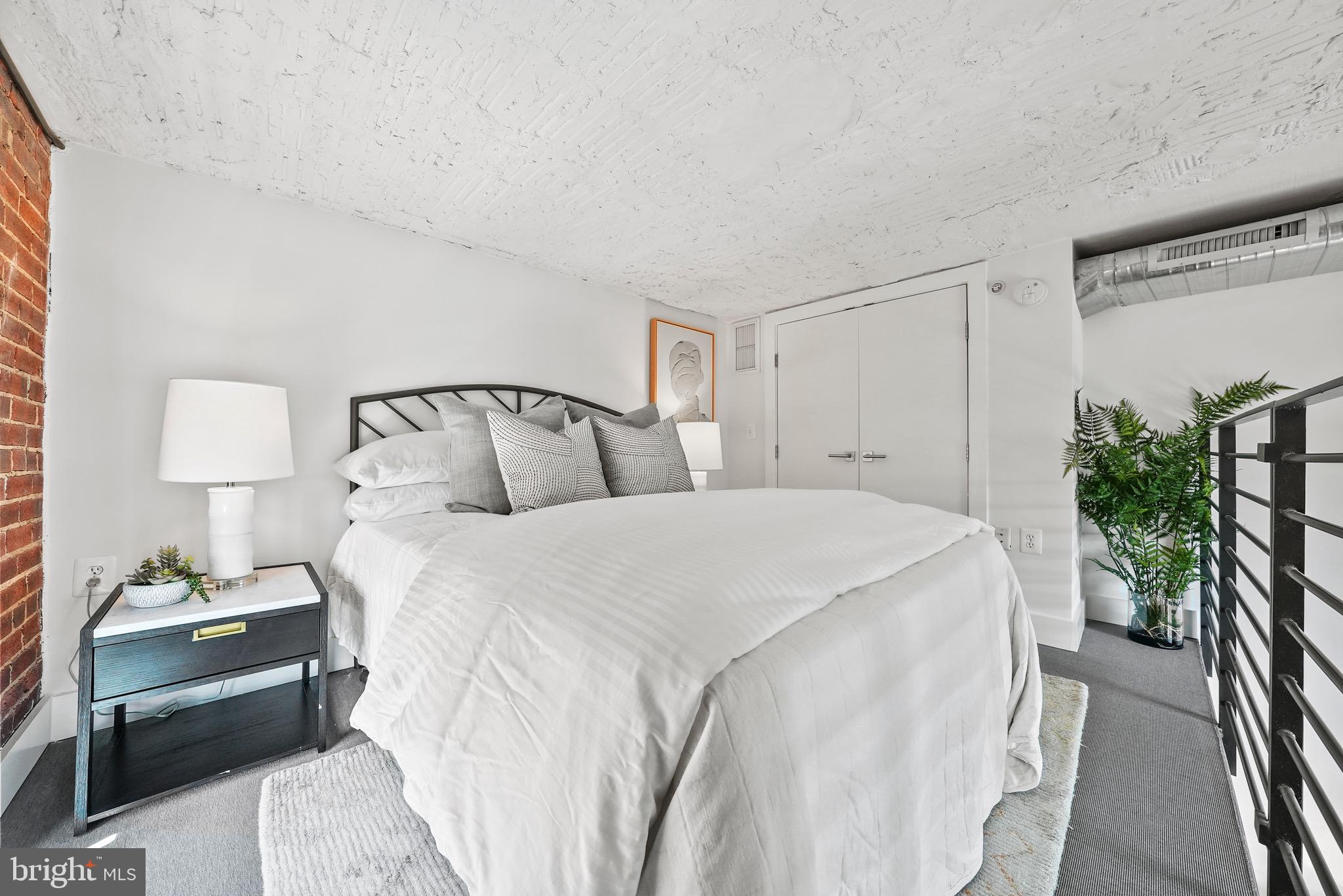 1401 R Street Northwest, Unit 310 Washington, DC 20009 - Photo 5 of 15 Lofted Bedroom