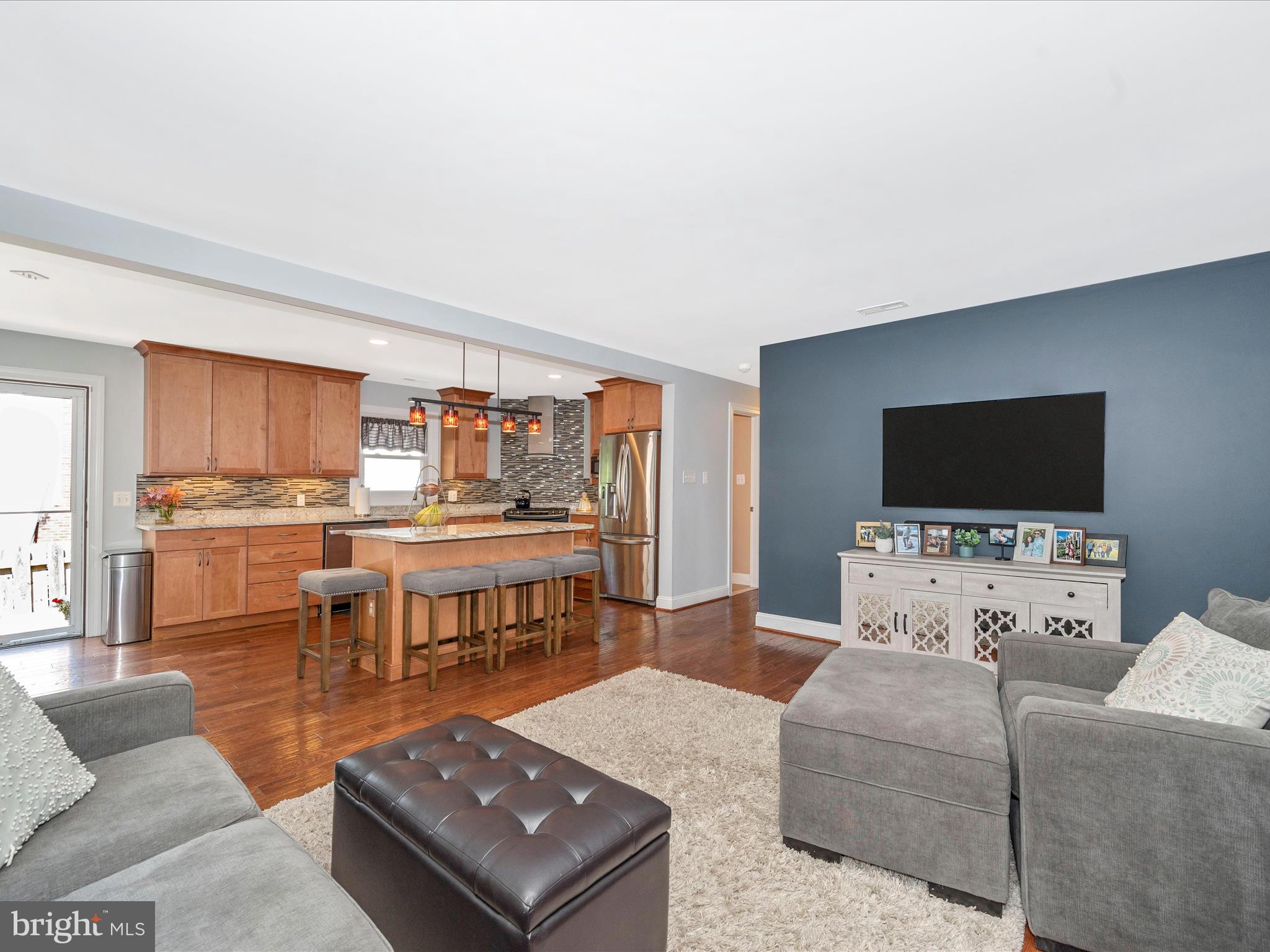100 Spring Street Gaithersburg, MD 20877 - Photo 14 of 56 Living room open to kitchen