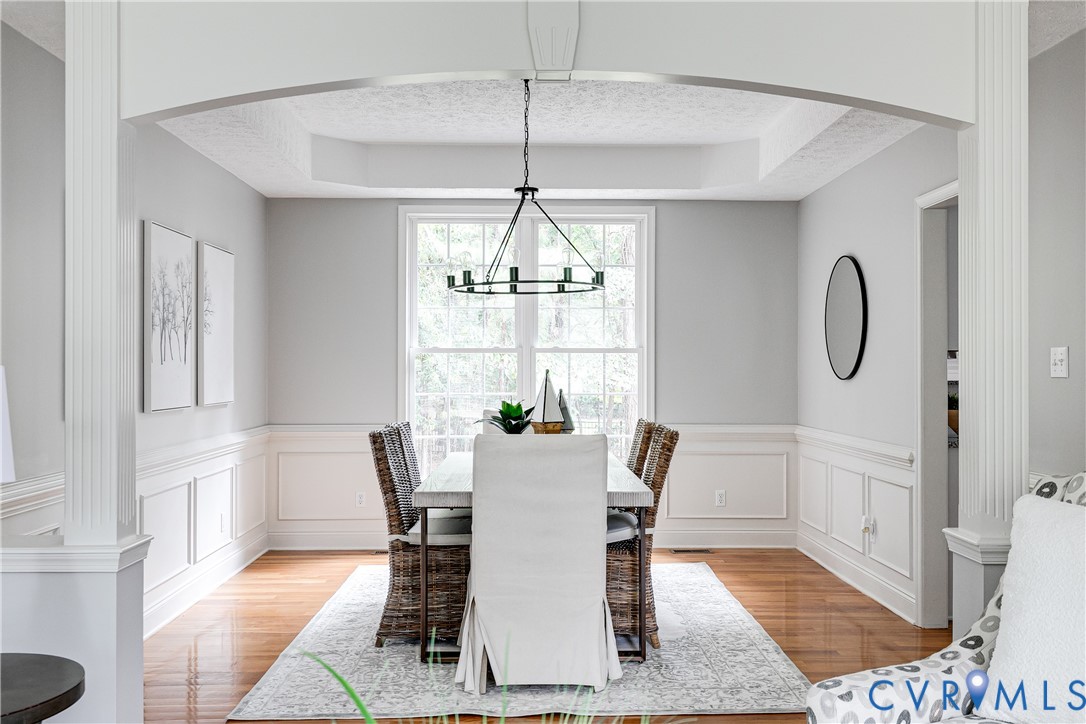 11401 Braidstone Lane Chesterfield, VA 23838 - Photo 12 of 47 Wainscoting, trey ceiling, gorgeous new chandelier