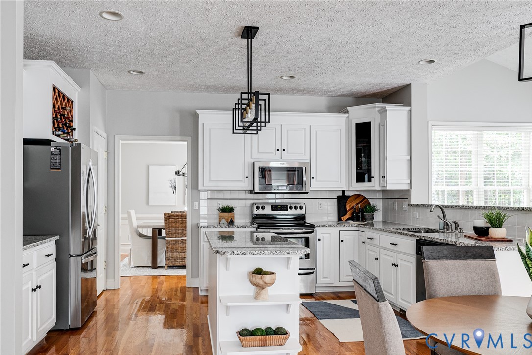 11401 Braidstone Lane Chesterfield, VA 23838 - Photo 16 of 47 Features both an island and a peninsula with seati