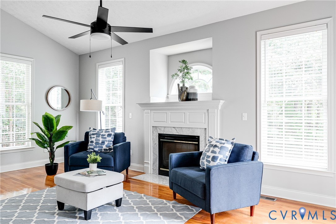 11401 Braidstone Lane Chesterfield, VA 23838 - Photo 21 of 47 Open to the kitchen, with a gas fireplace, new cei