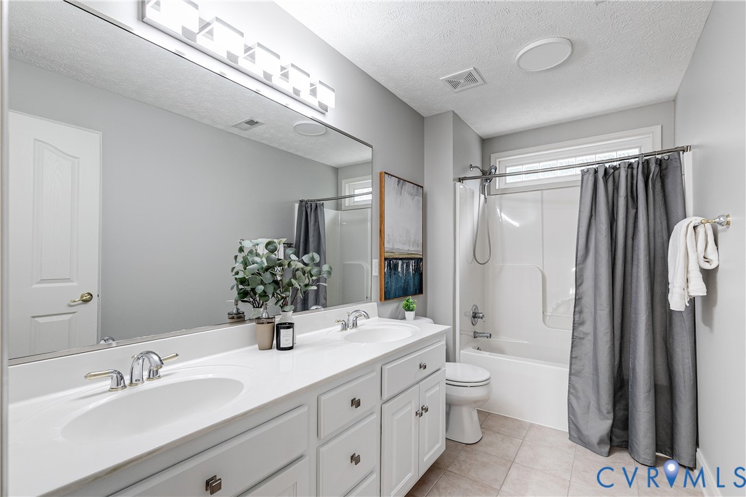 11401 Braidstone Lane Chesterfield, VA 23838 - Photo 34 of 47 Upstairs Hall bathroom with double sinks.