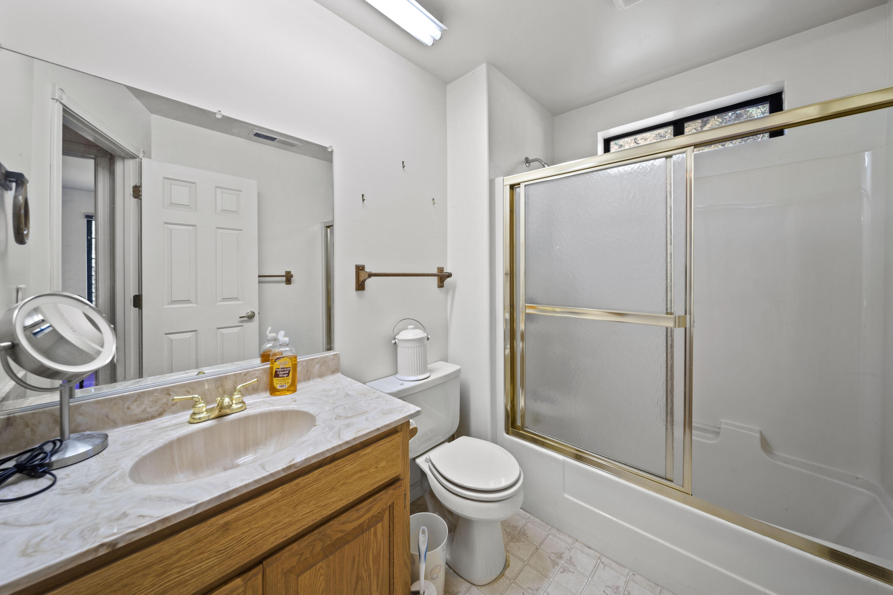 21110 Rolling Hills Road Manton, CA 96059 - Photo 20 of 34 a bathroom with a sink toilet and shower