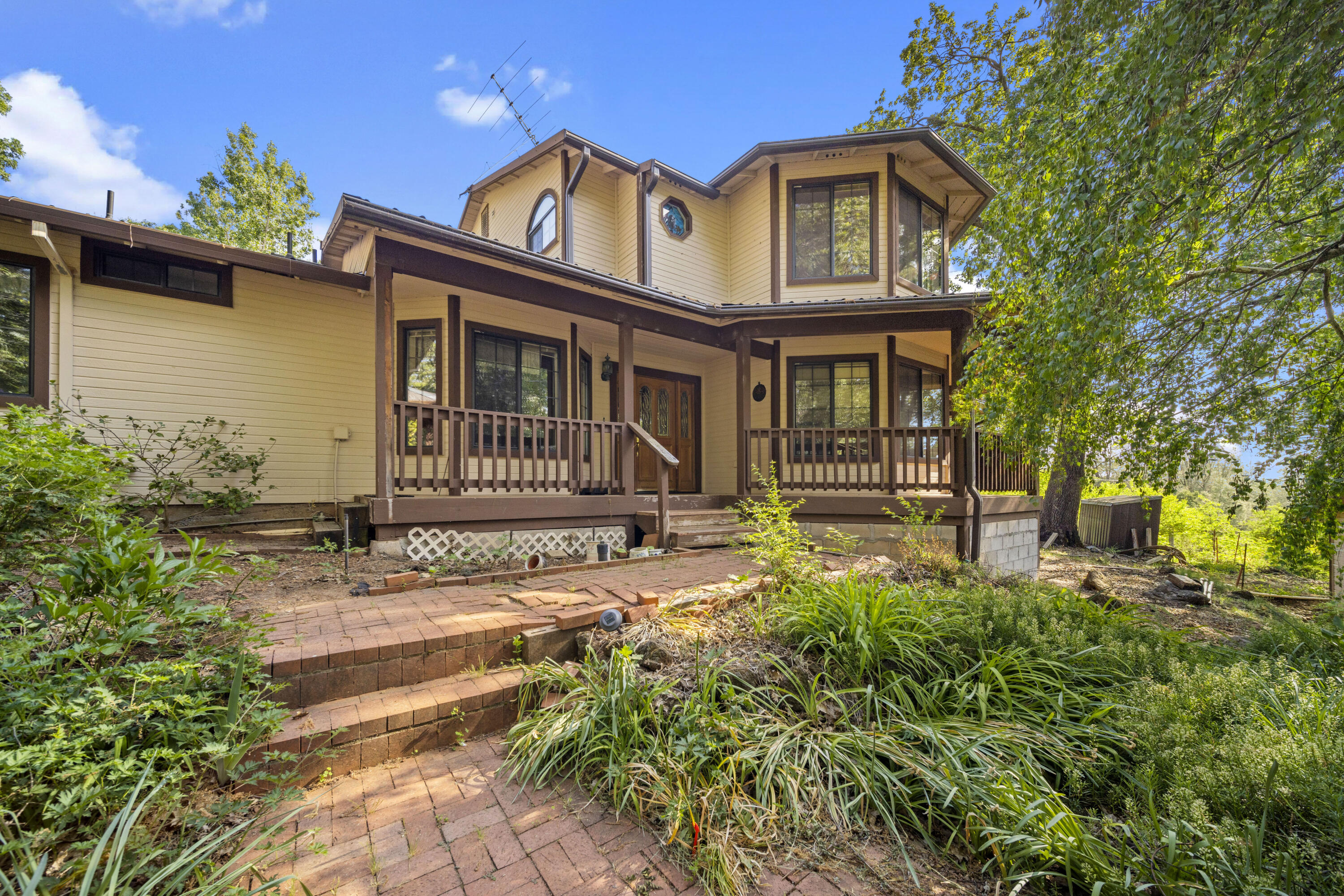21110 Rolling Hills Road Manton, CA 96059 - Photo 2 of 34 front view of a house with a small yard