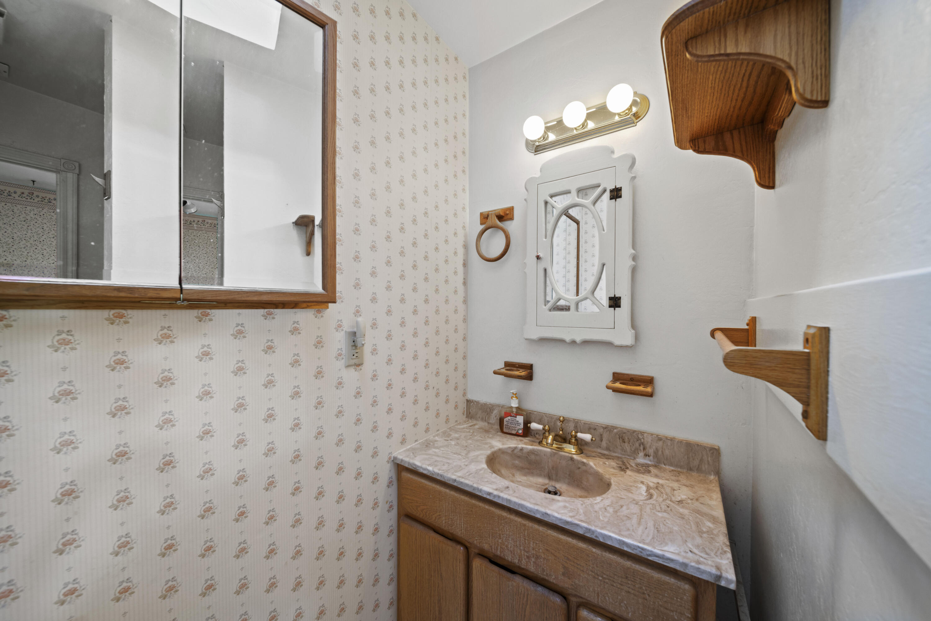 21110 Rolling Hills Road Manton, CA 96059 - Photo 21 of 34 a bathroom with a sink and a mirror
