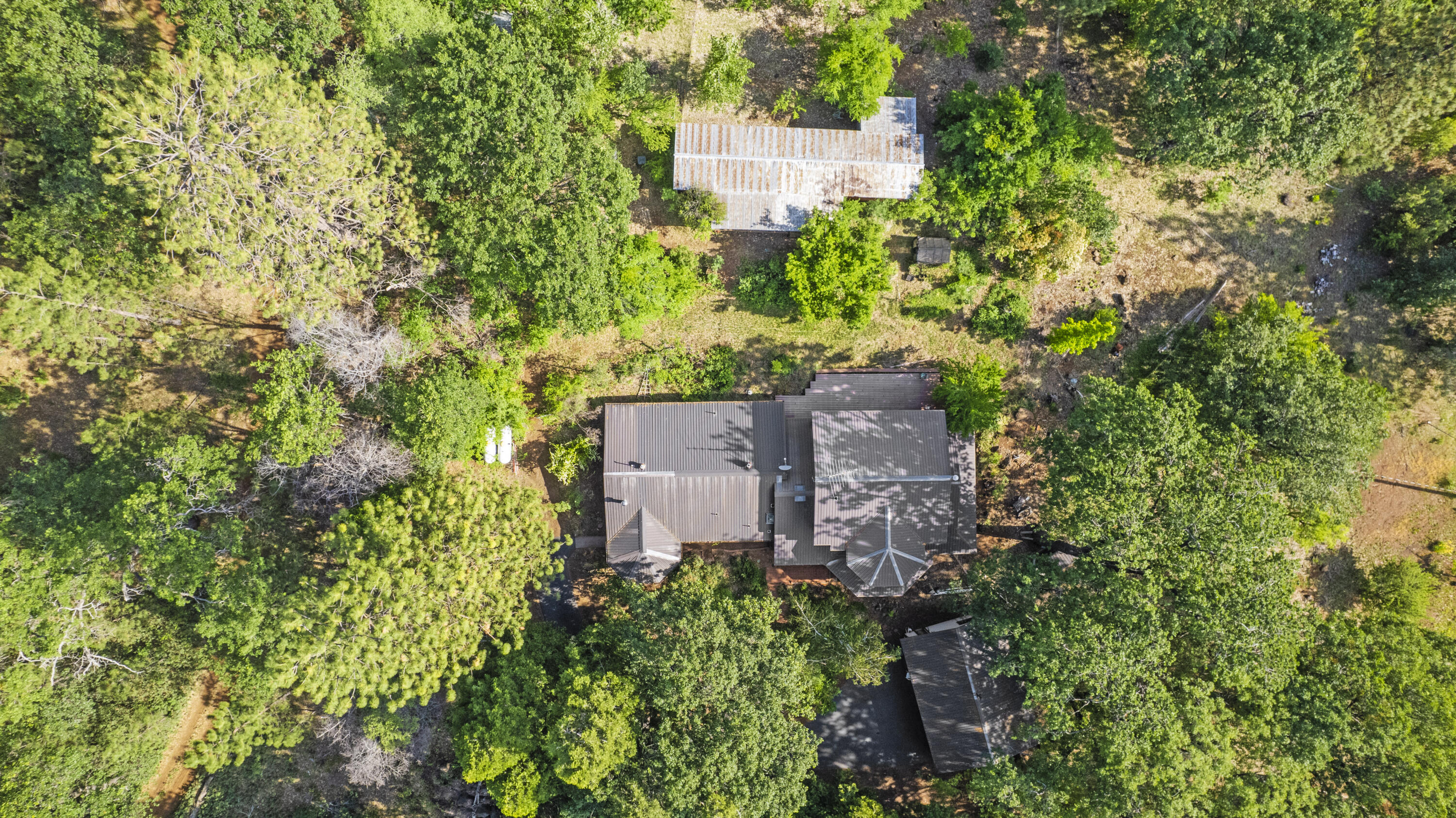 21110 Rolling Hills Road Manton, CA 96059 - Photo 27 of 34 an aerial view of a house with a yard and garden