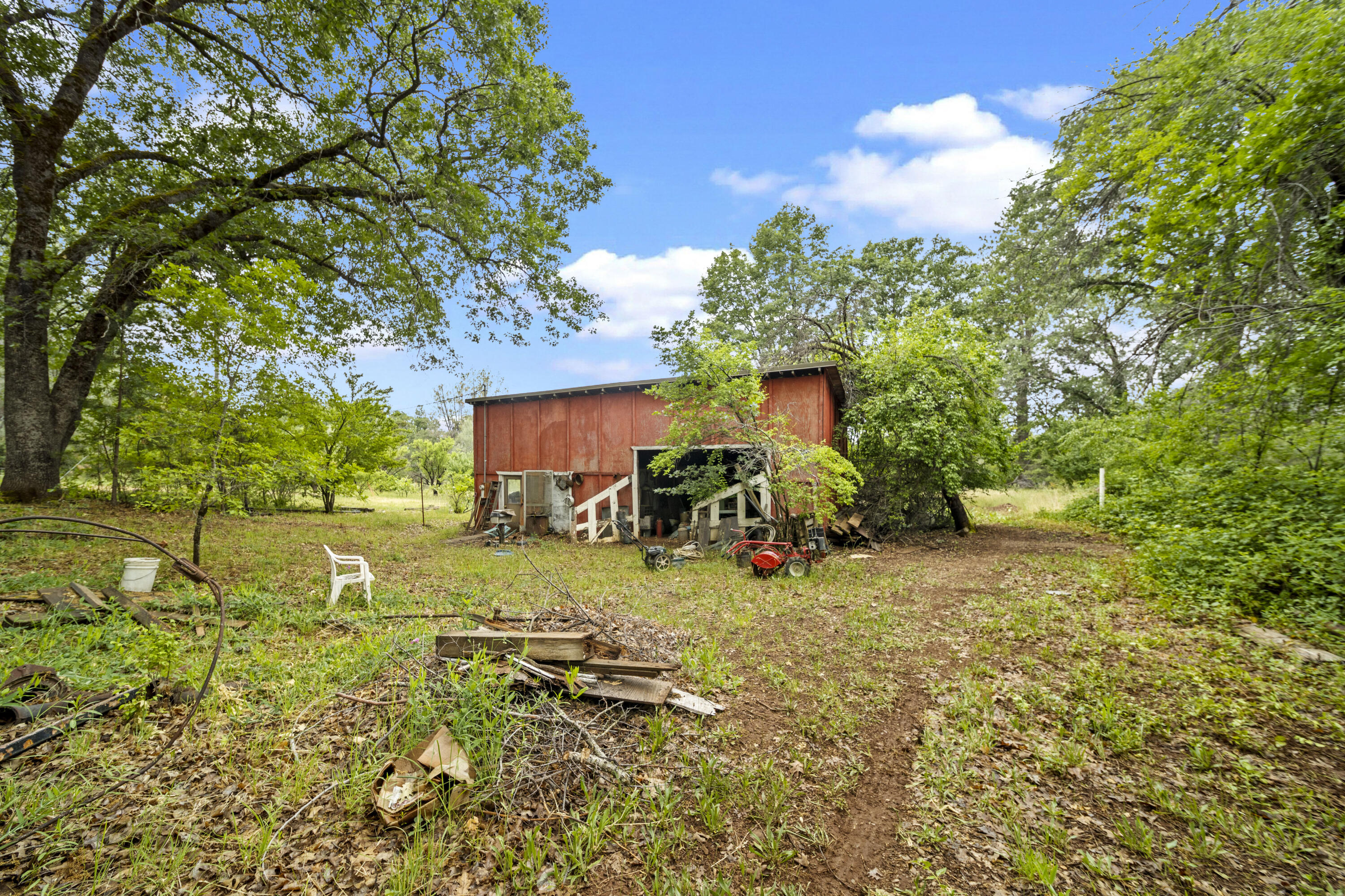 21110 Rolling Hills Road Manton, CA 96059 - Photo 31 of 34 a view of a house with a yard