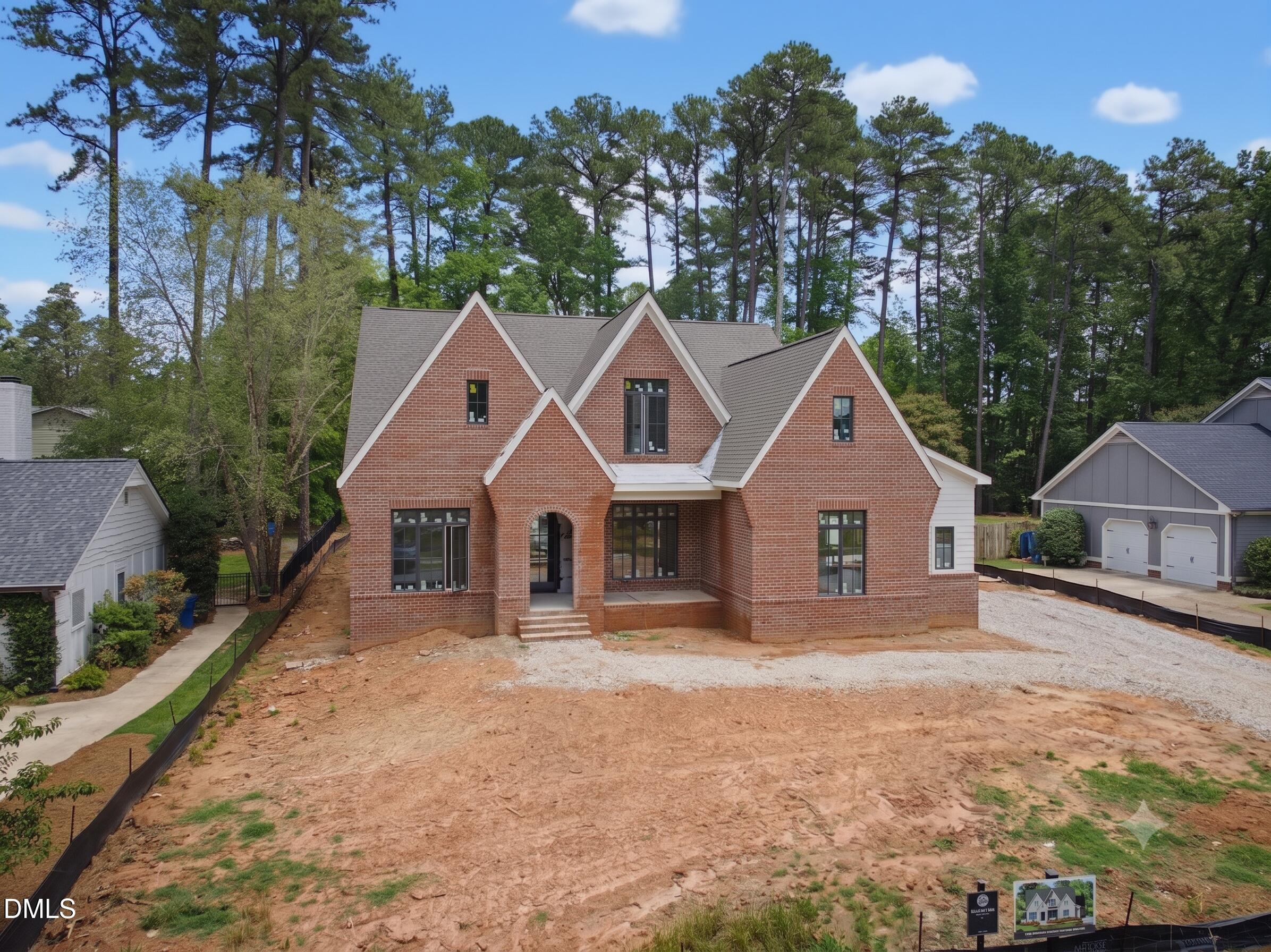 7508 Grist Mill Road Raleigh, NC 27615 - Photo 32 of 32 front view of a house with a yard