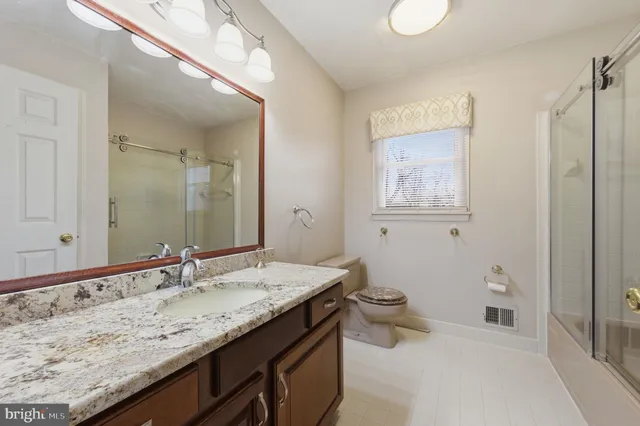 a view of livingroom with hardwood floor and hallway