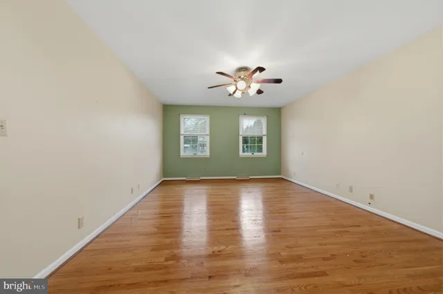 a bathroom with a toilet sink and shower