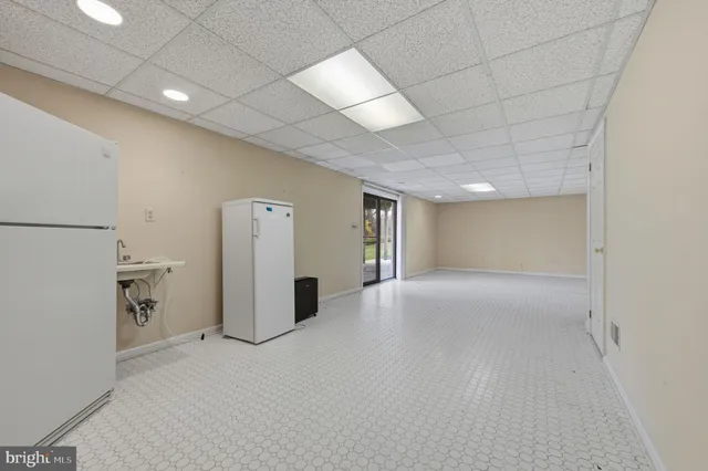 a view of a house with a yard porch and sitting area