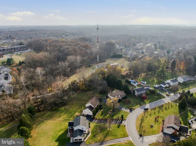 an aerial view of a house with a garden