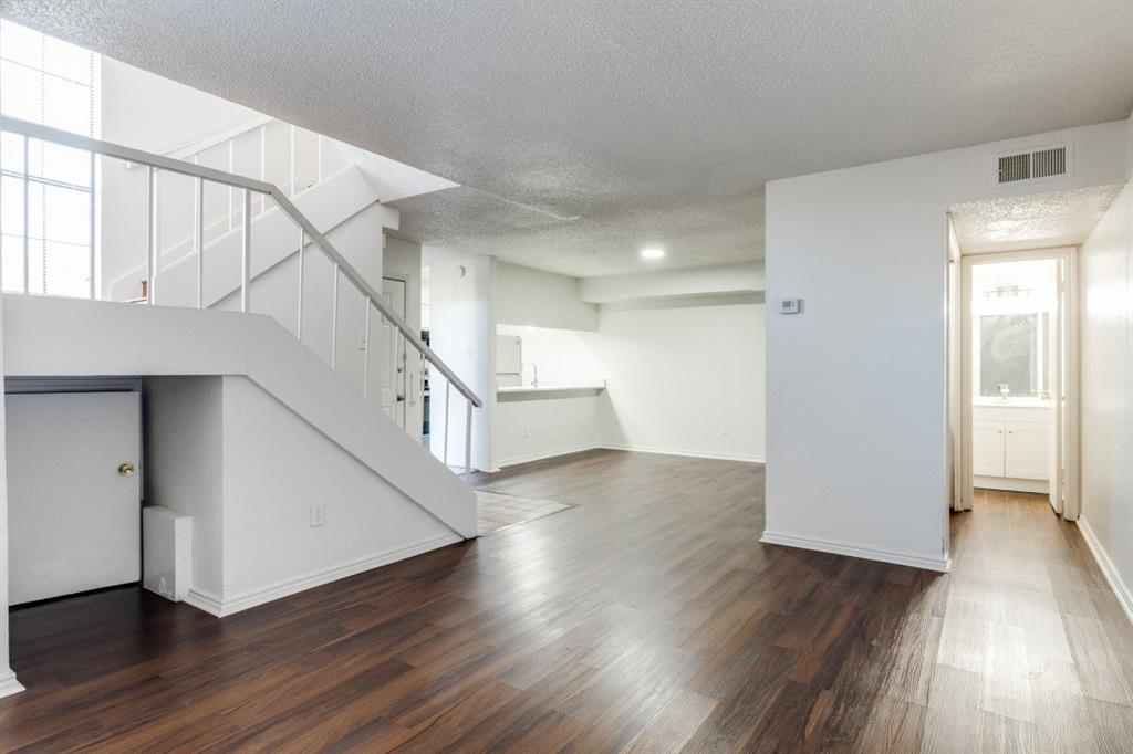 11311 Audelia Road, Unit 239 Dallas, TX 75243 - Photo 10 of 12 a view of entryway with wooden floor