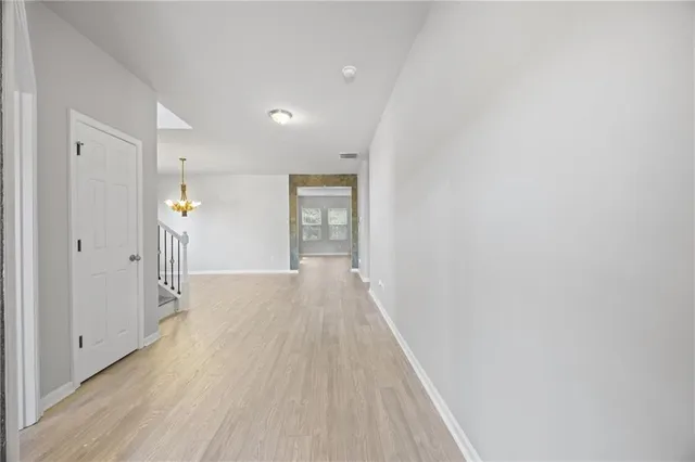 a view of wooden floor in an empty room