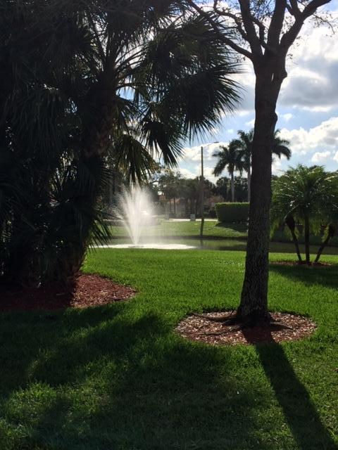 6067 Caladium Road Delray Beach, FL 33484 - Photo 31 of 33 FLORAL LAKES LANDSCAPE