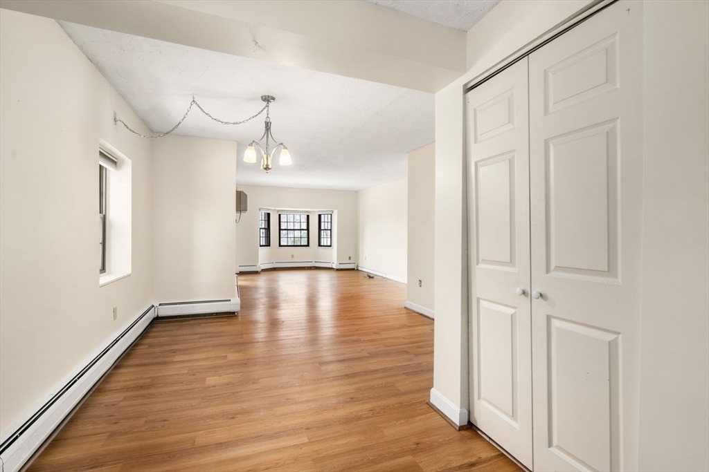 16 Winter Street, Unit 41C Waltham, MA 02451 - Photo 5 of 25 a view of an entryway with wooden floor