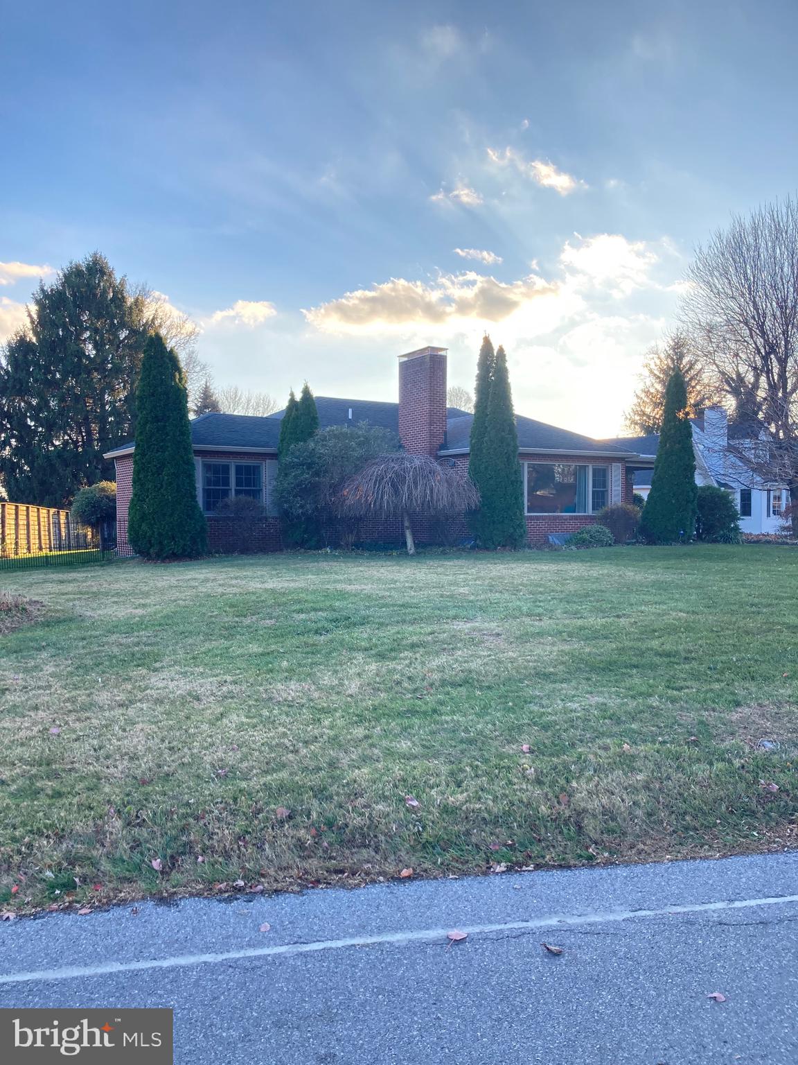 18807 Crofton Road Hagerstown, MD 21742 - Photo 2 of 5 a view of a yard with a house in the background