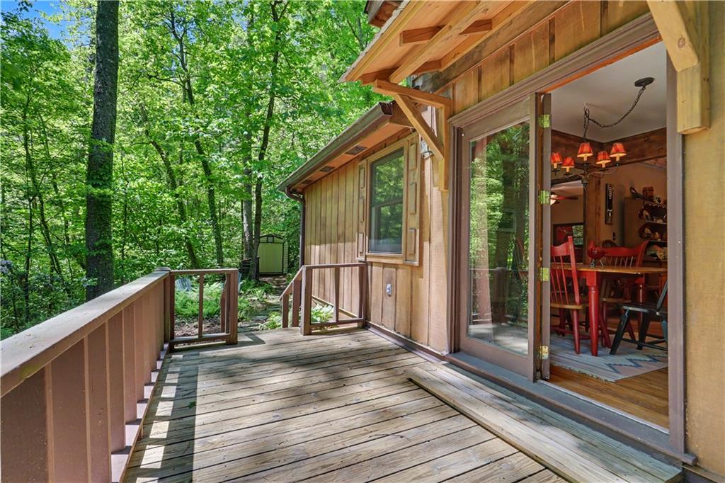 102 Moses Road Rabun Gap, GA 30568 - Photo 29 of 40 a view of a house with backyard from deck