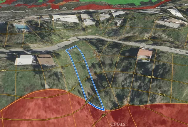 a view of a swimming pool with a yard