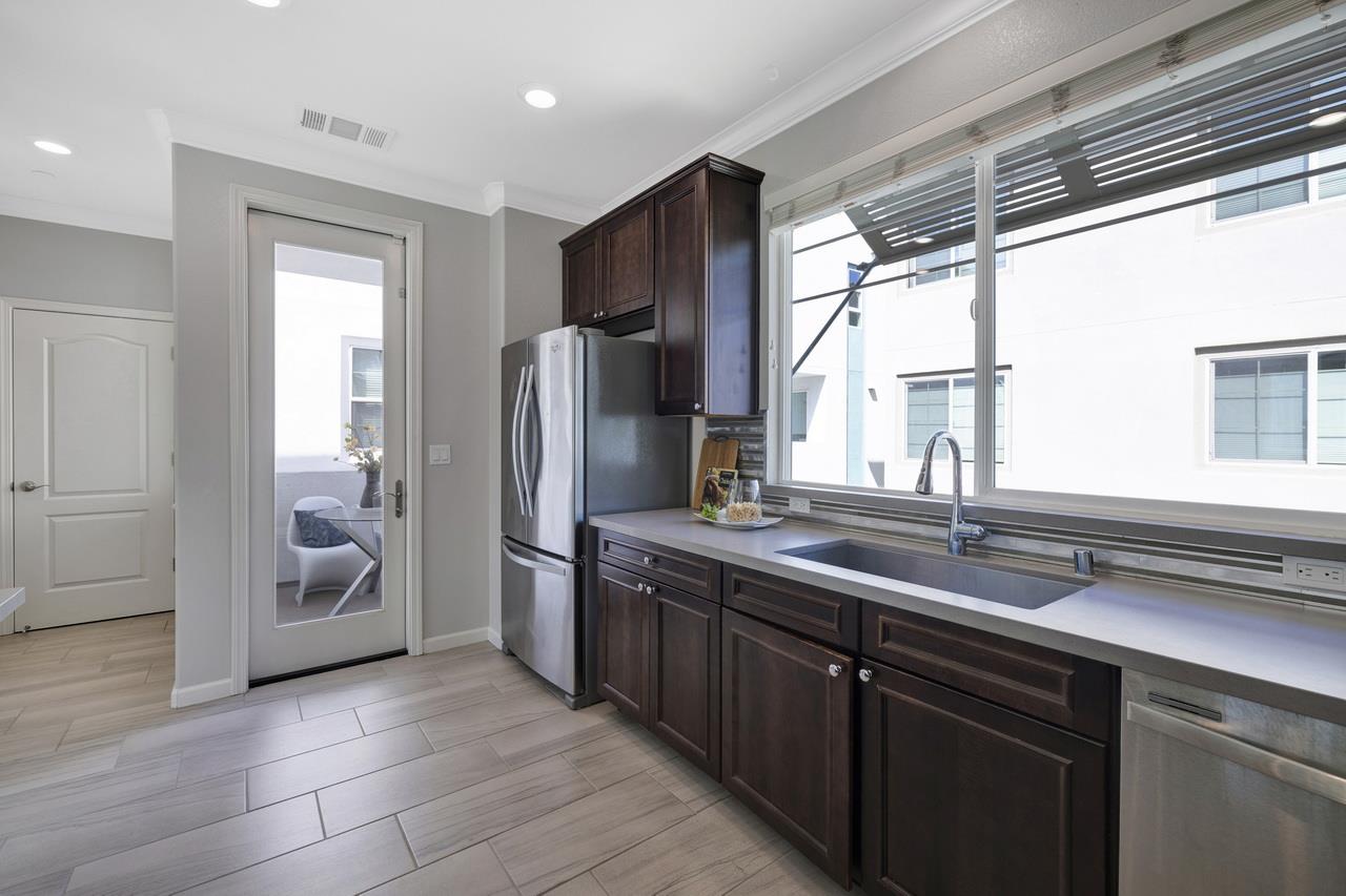 3079 Manuel Loop San Jose, CA 95136 - Photo 20 of 64 a kitchen with a sink refrigerator and window