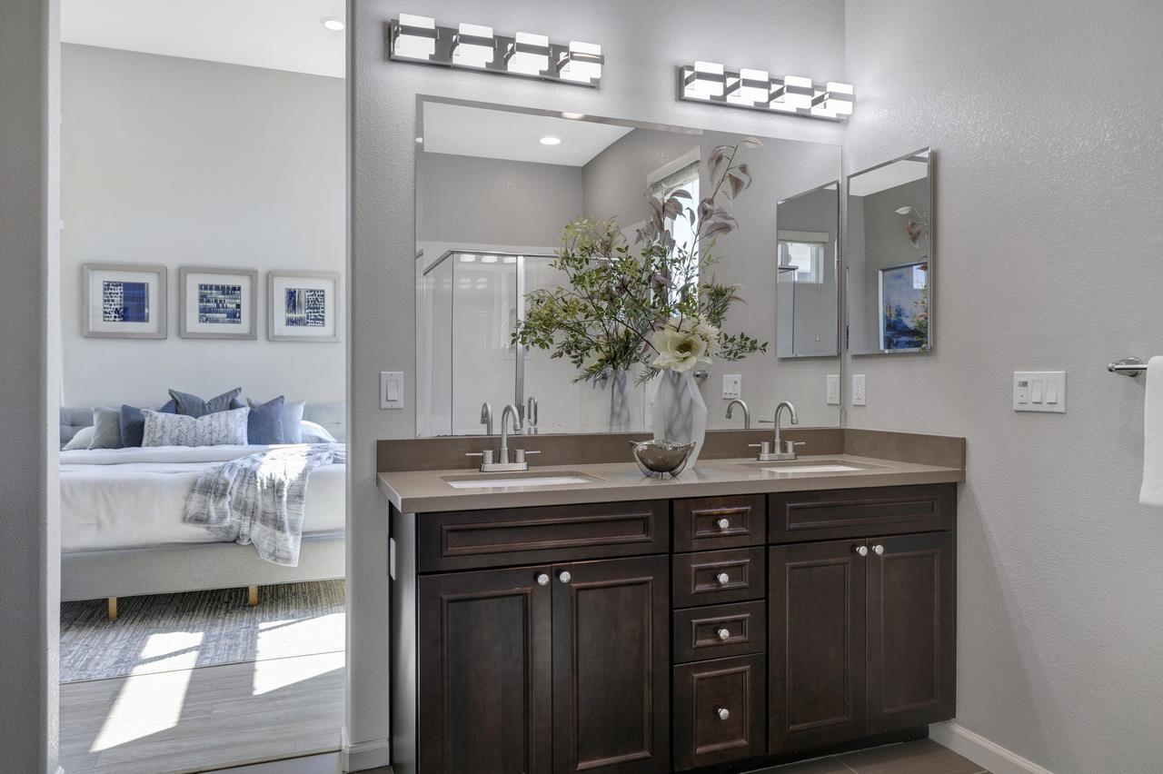 3079 Manuel Loop San Jose, CA 95136 - Photo 33 of 64 a spacious bathroom with double vanity and a mirror