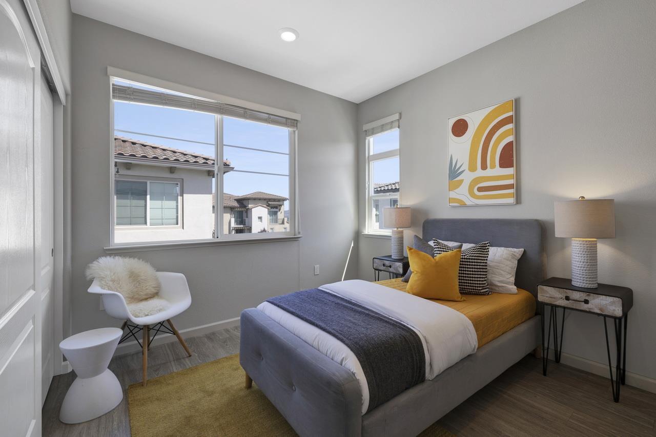 3079 Manuel Loop San Jose, CA 95136 - Photo 36 of 64 a bedroom with a bed and wooden floor