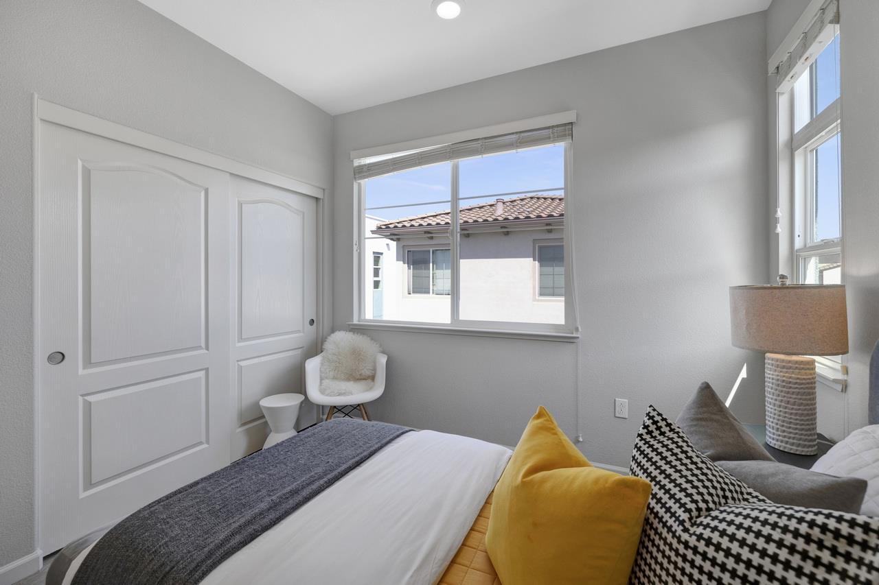 3079 Manuel Loop San Jose, CA 95136 - Photo 39 of 64 a bedroom with a bed and wooden floor