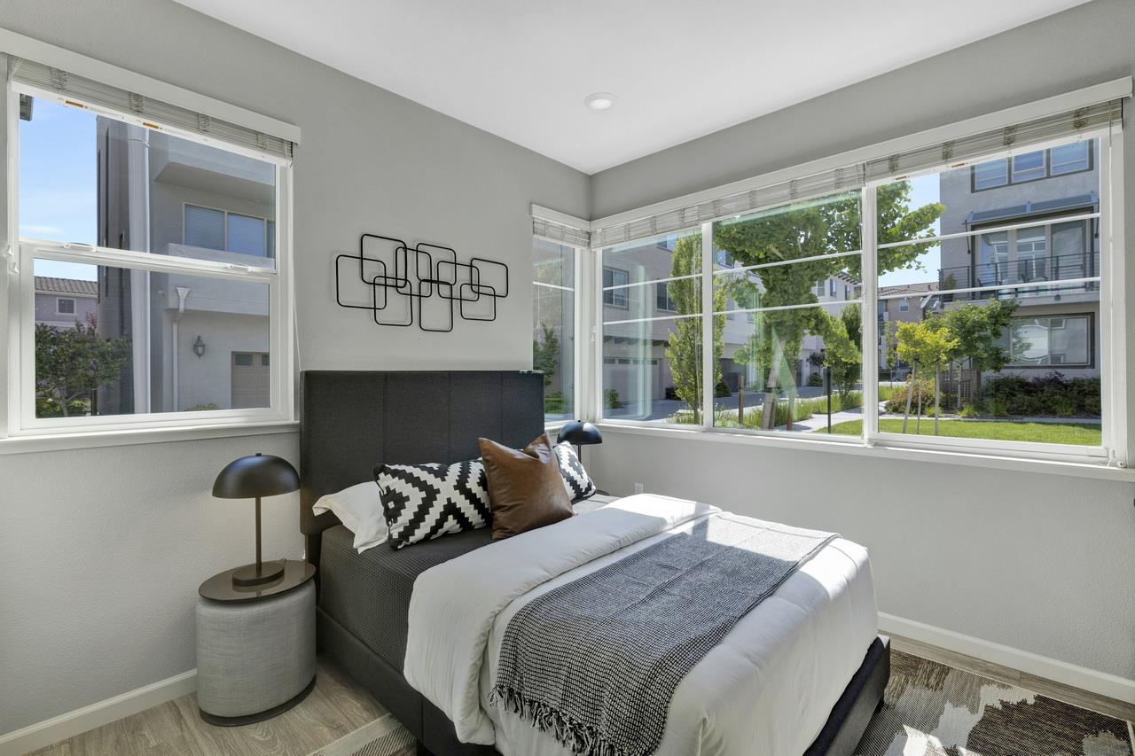 3079 Manuel Loop San Jose, CA 95136 - Photo 43 of 64 a bedroom with a bed and a large window