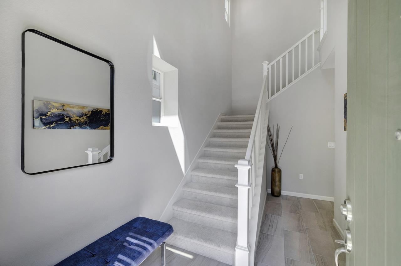 3079 Manuel Loop San Jose, CA 95136 - Photo 5 of 64 a view of staircase with wooden floor and stairs