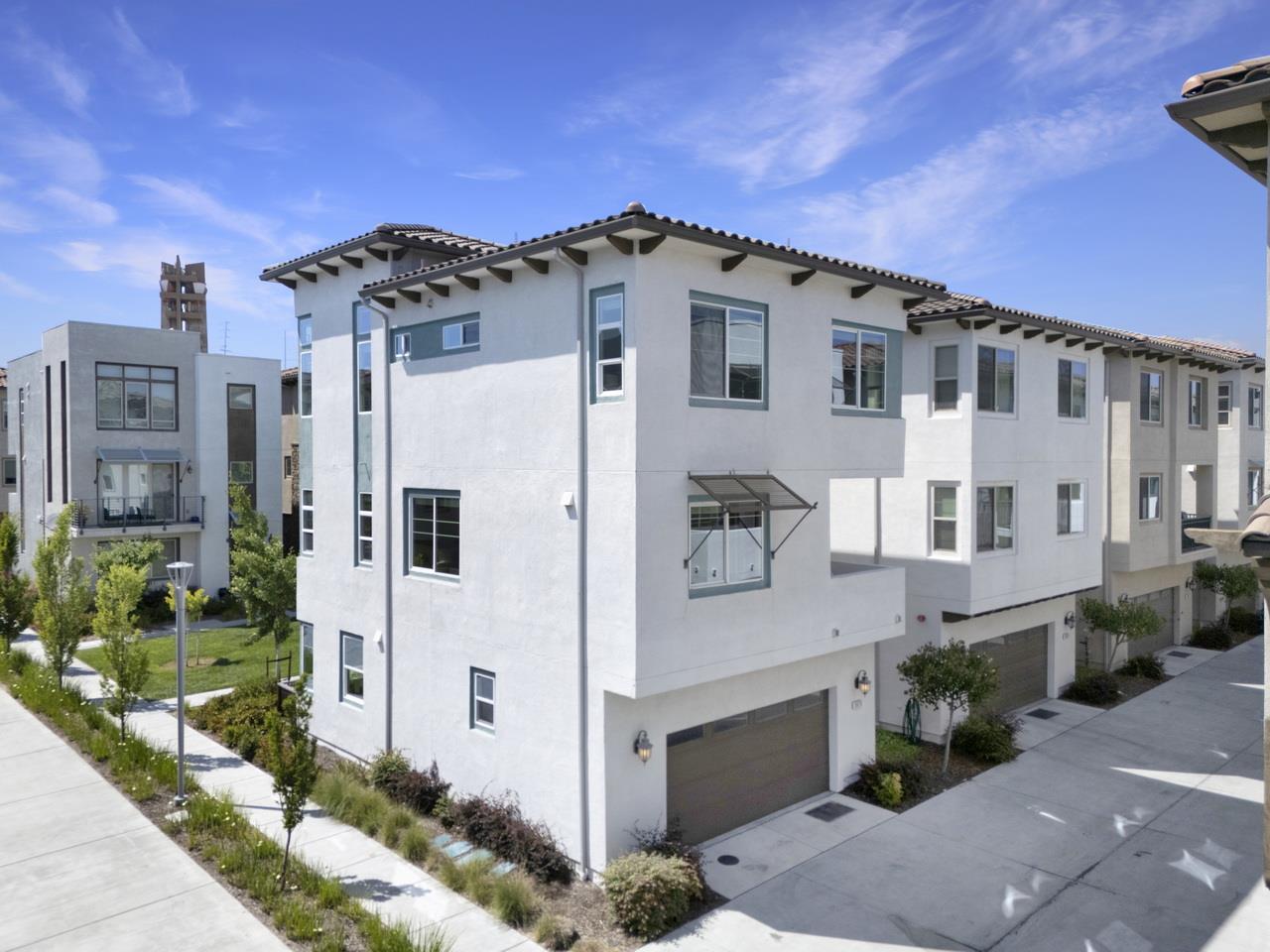 3079 Manuel Loop San Jose, CA 95136 - Photo 52 of 64 a large white building with a white roof