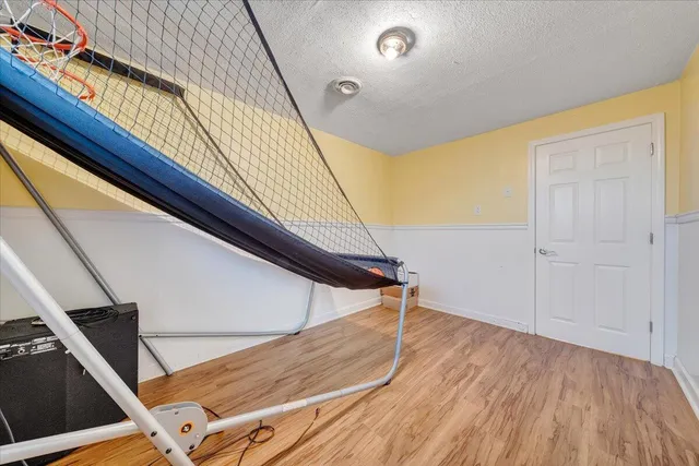 a room with furniture and screen