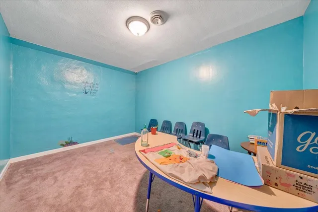 a room with furniture and a wooden floor