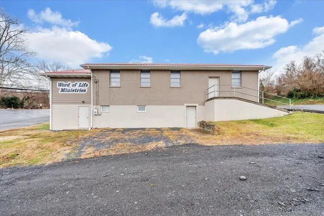 a view of swimming pool with a yard