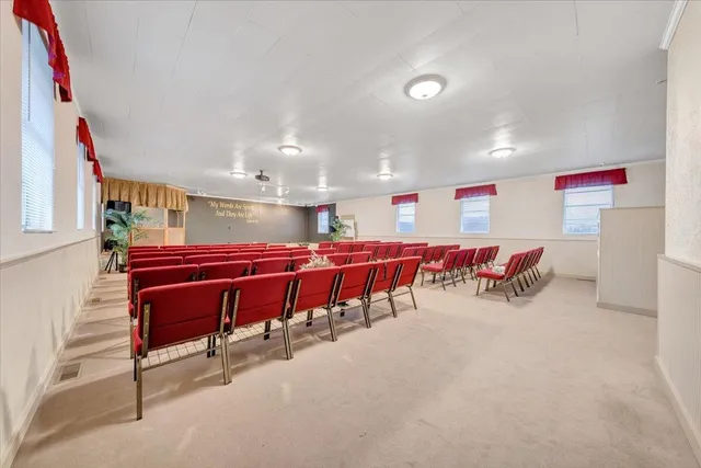 a room with furniture and air hockey table